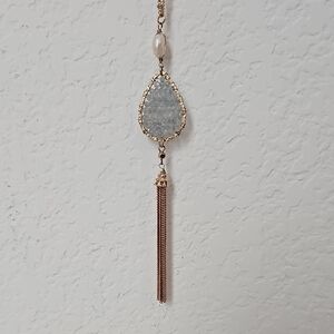 Elegant Gold and Silver Teardrop Pendant Necklace